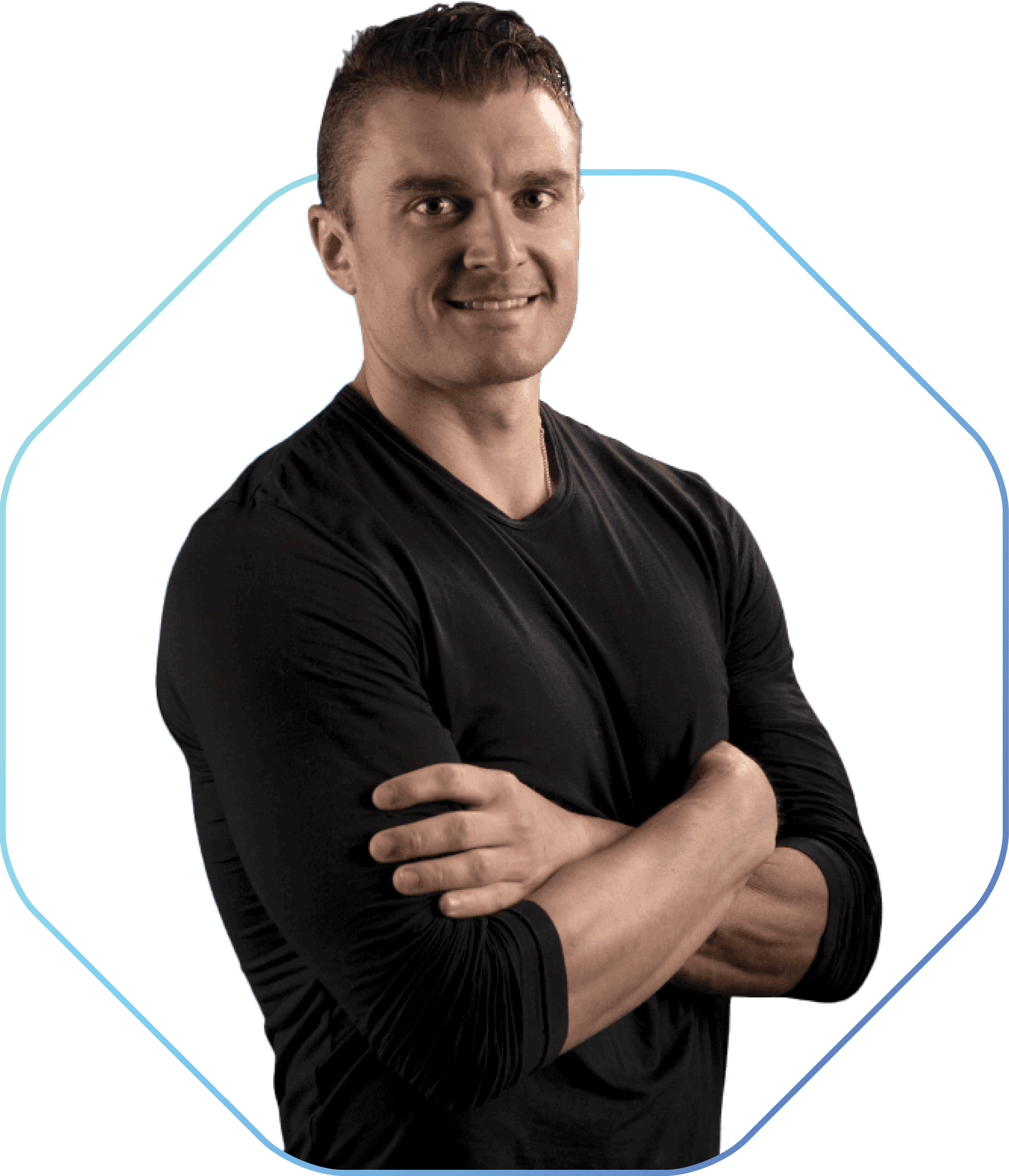 A man with short hair stands with his arms crossed, wearing a fitted black long-sleeve shirt, against a plain background with a blue outline shape behind him, embodying the confidence seen in coya for fitness clubs.