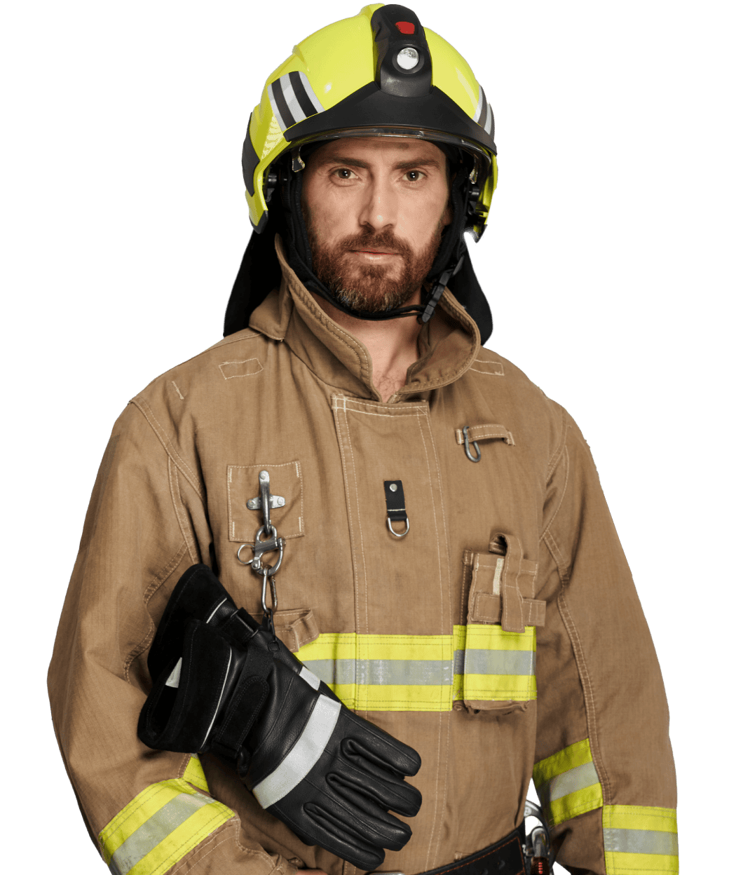 A firefighter in full uniform and helmet stands facing forward, holding a pair of black protective gloves, ready for action with the confidence of Coya.