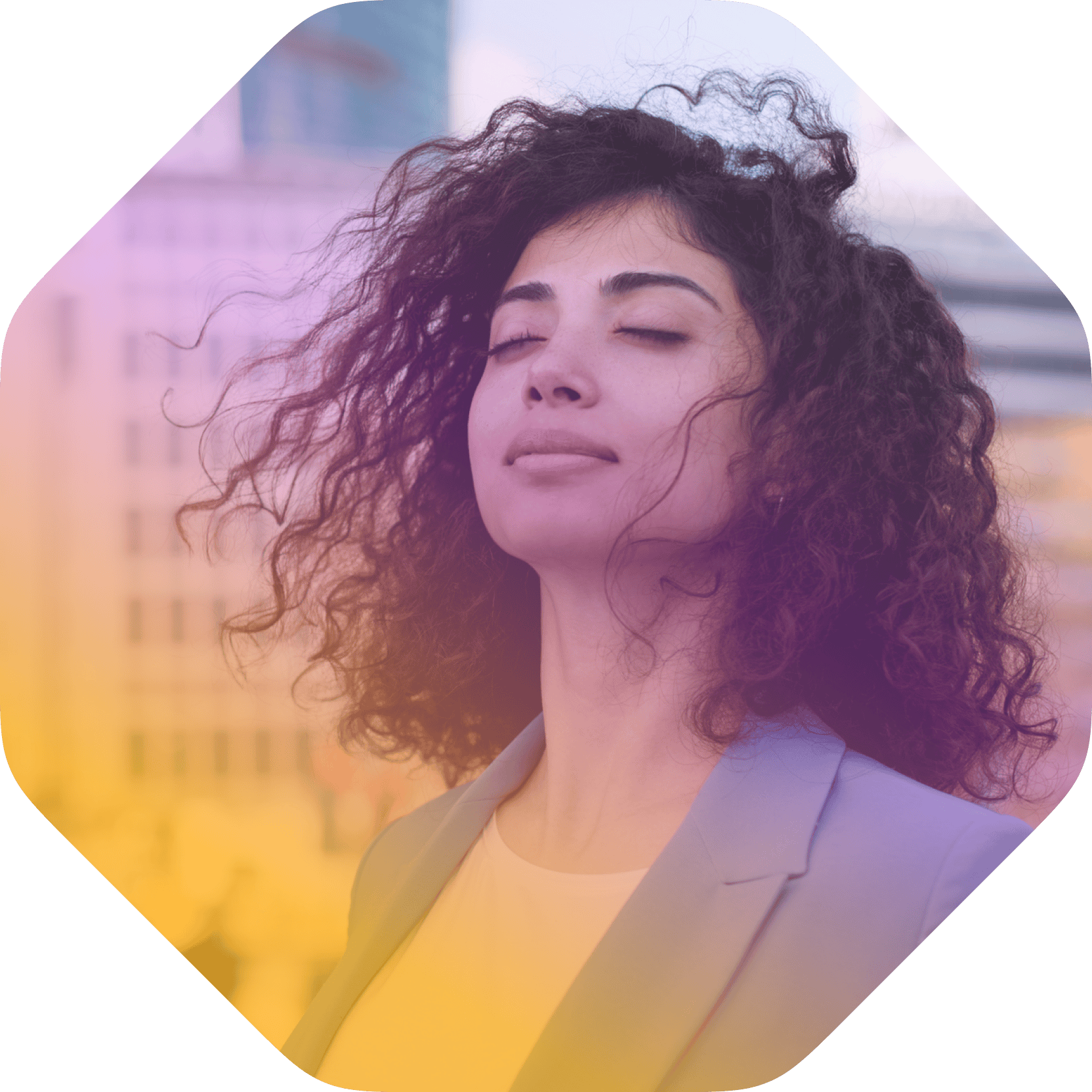 Executive well being doesn't have to come at a cost. Image of a woman in a suit looking peaceful in a city setting.