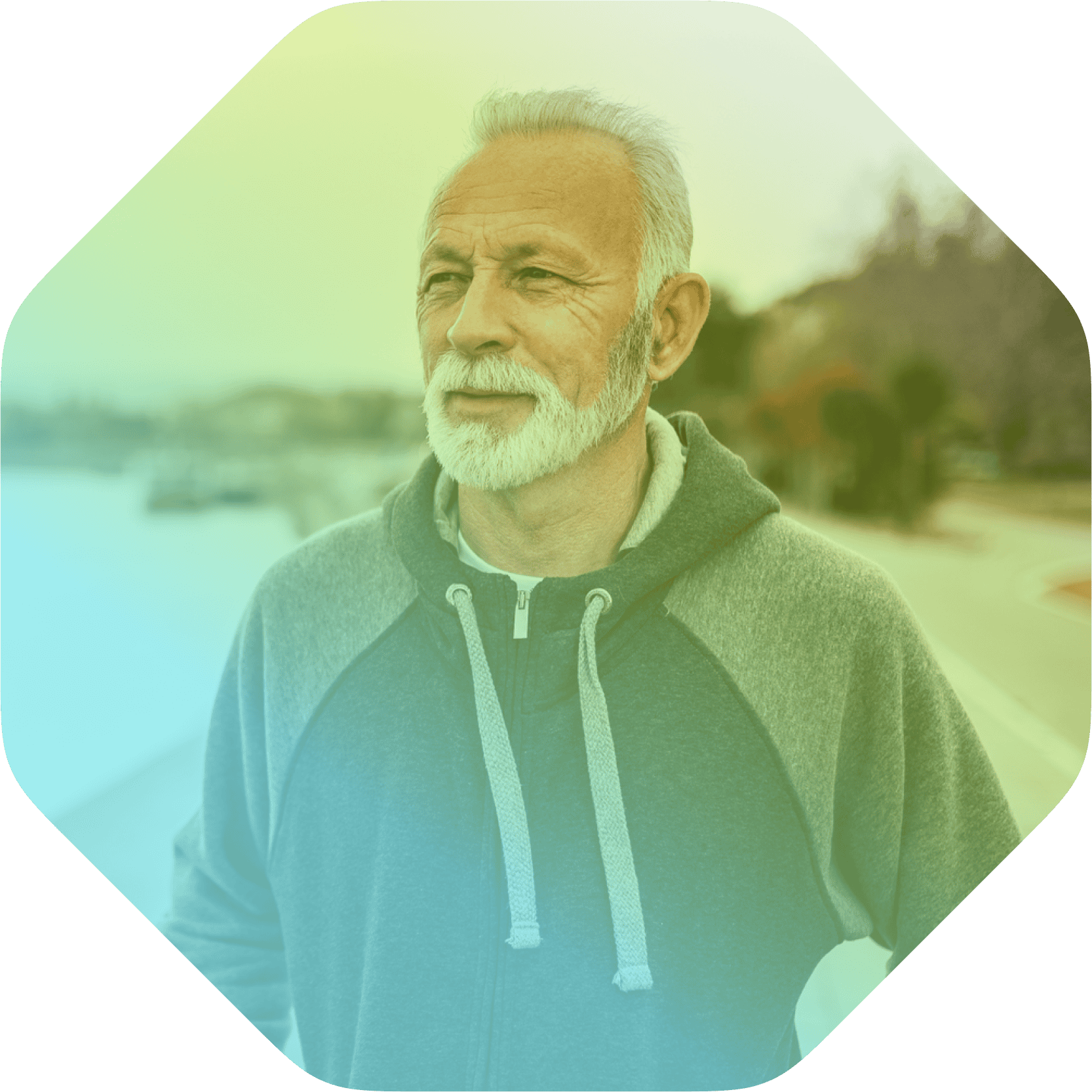 Older man with gray hair and beard stands outdoors in a hoodie, looking into the distance with a neutral expression. The image features a colorful overlay, rounded corners, and highlights Coya for first responders.