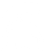 White Spartan helmet silhouette facing right on a plain, light background, evoking the strength and resilience embodied by Coya.